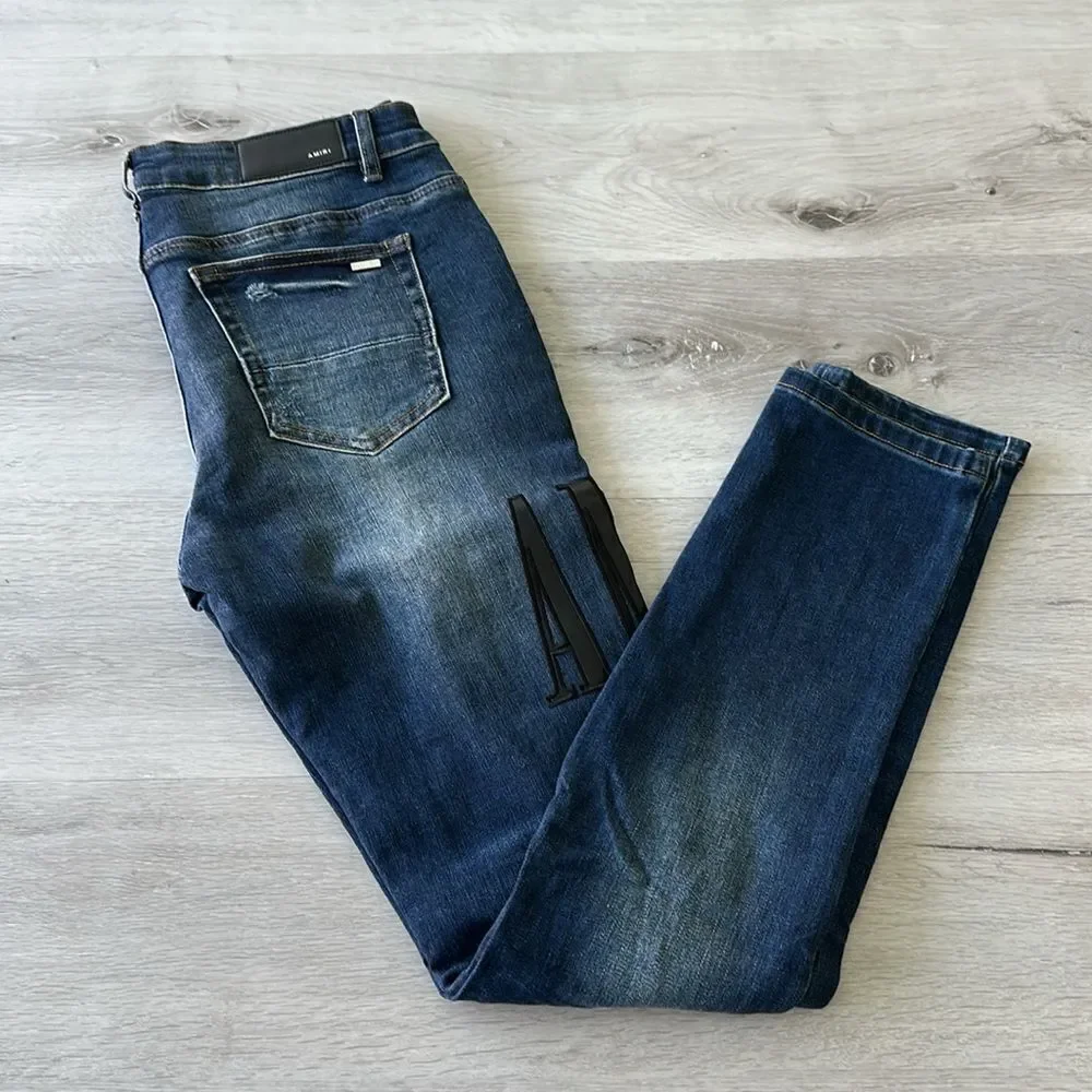 AMIRI Skinny-Fit Leather Appliquéd Distressed Jeans Blue/Black 32 NWT
